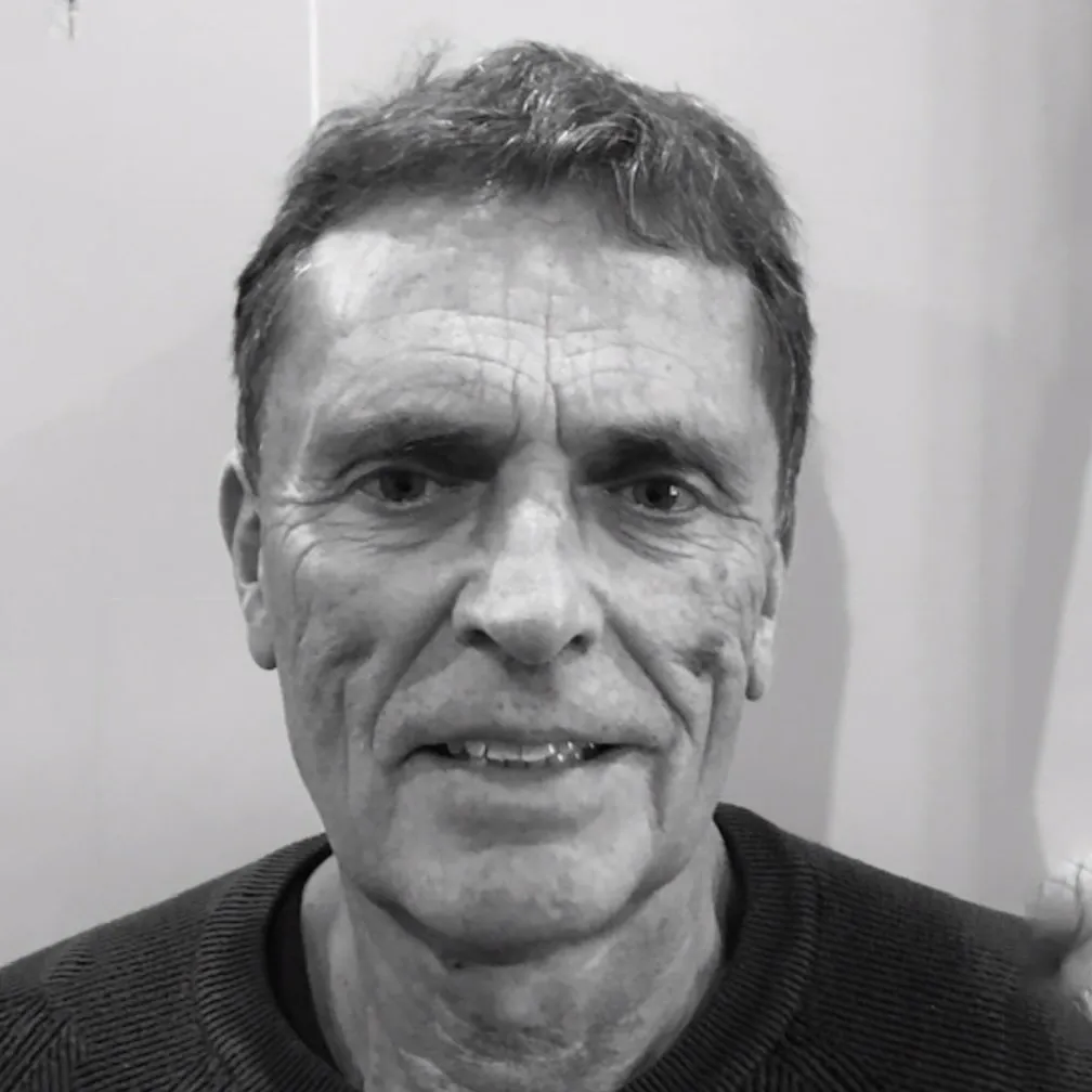 Russell Beckford, site manager at Pyrmont Homes, in a black and white portrait.
